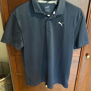 Boys Puma navy blue golf shirt. 12-14